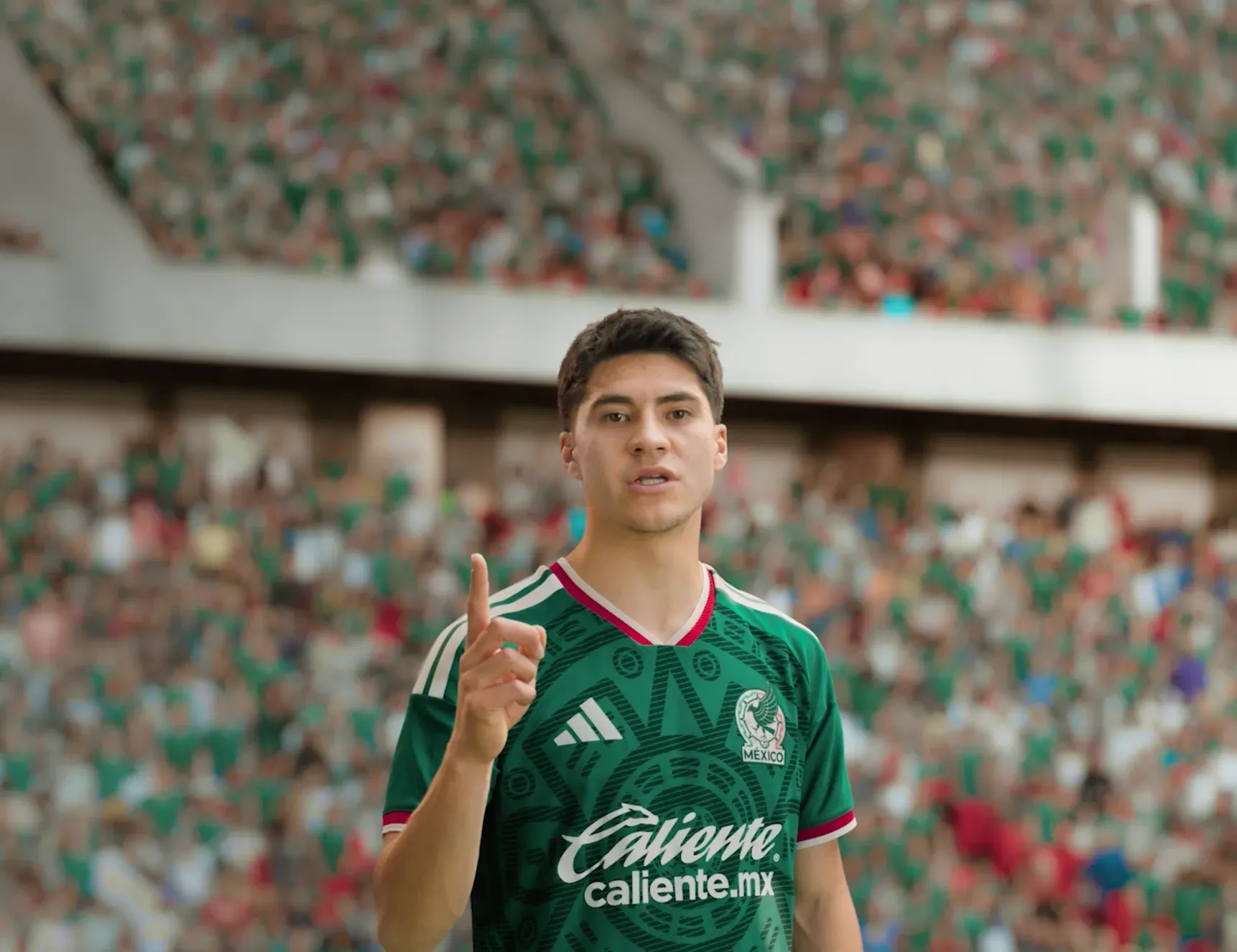 A Mexico national team player in the stadium, raising one finger
